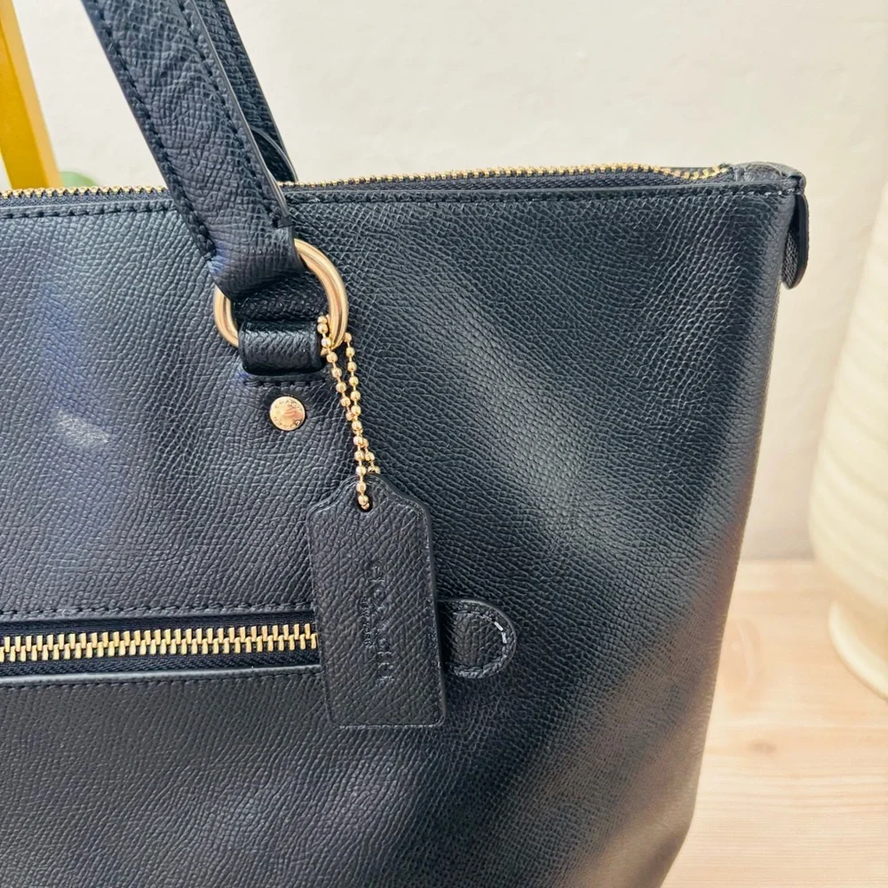 Coach sleek black